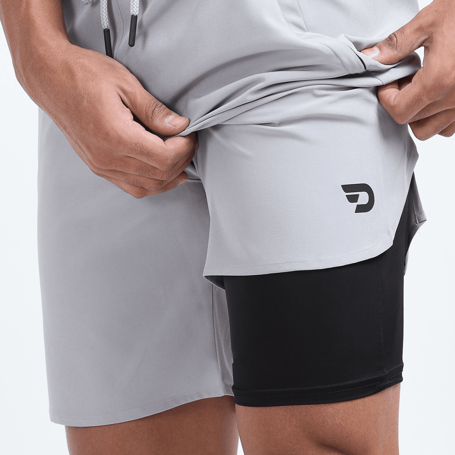 Denmonk's fashionable 2-IN-1 SHORTS light grey shorts for men will boost your level of gym fitness.